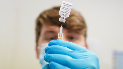 Jack McDermott draws up the AstraZeneca/Oxford University COVID-19 vaccine at Acklam Road pharmacy on January 28, 2021 in Middlesbrough, England. 