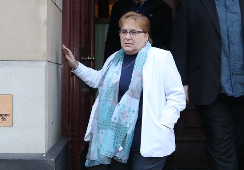 Bridie Tedford leaves after the sentencing of her husband Albert Tedford at the Supreme court in Melbourne.