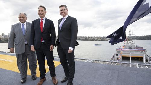 US Secretary of the Navy, Carlos Del Toro, Deputy Prime Minister Richard Marles and Minister for Defence Industry, Pat Conway, at the launch of the bilateral military exercise, Talisman Sabre, on the HMAS Canberra on Garden Island, Sydney. July 21, 2023 Photo: Janie Barrett
