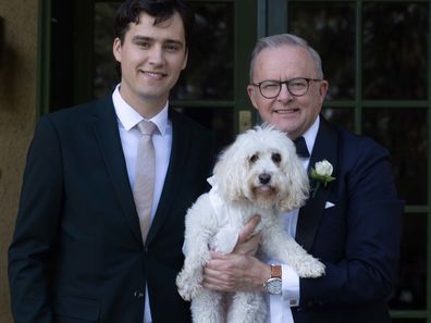 The Prime Minister Anthony Albanese with his son Nathan and ringbearer Toto before the ceremony today in Canberra.