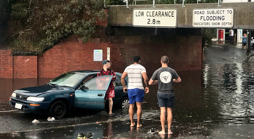 A car became stuck in floodwaters at the York Street underpass. 