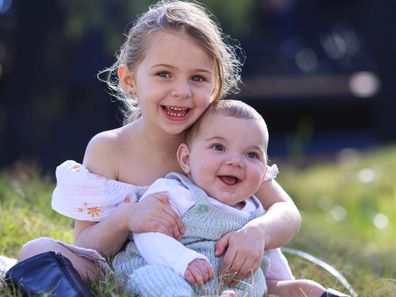 Lara and her baby brother are the best of friends. 