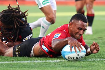 Sevu Reece of the Crusaders scores a try during the round one Super Rugby Pacific match.