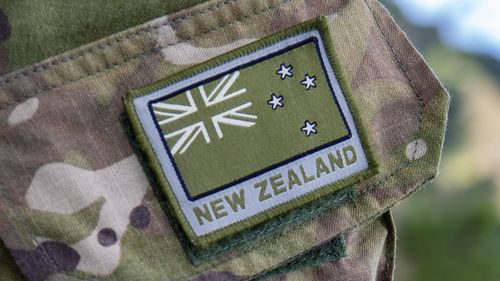 A soldier wears a New Zealand army emblem on exercise in the Nausori Highlands in Fiji, Sept. 9, 2022. (Petty Officer Chris Weissenborn/NZ Defence via AP)