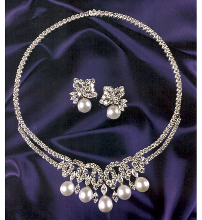 The Swan Lake Suite worn by Princess Diana at her final official engagement is being sold in auction.