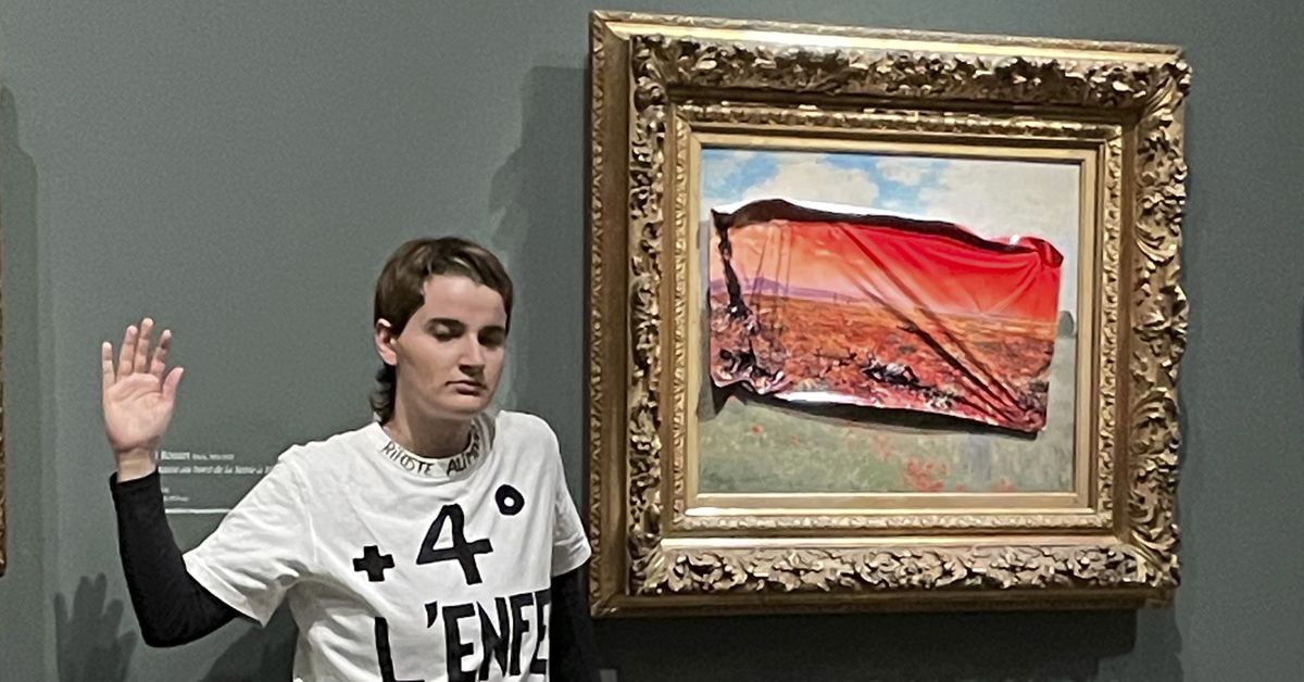 A climate activist in Paris stuck a protest poster on Monet’s Poppy Field painting