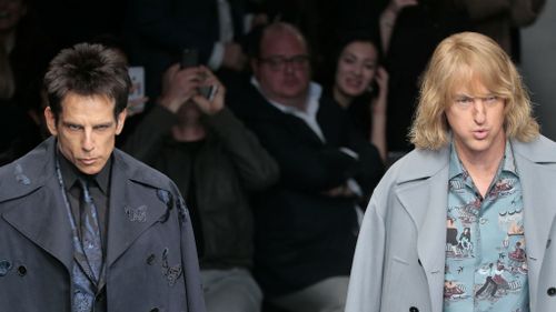 Ben Stiller and Owen Wilson make a surprise appearance on the catwalk in Paris. (AAP)