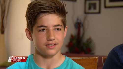 Jonathan, 13, filmed diagous packing up "hundreds" of baby formula tins. (A Current Affair)