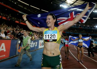 MELBOURNE, AUSTRALIA - MARCH 23:  Jana Pittman of Australia celebrates after winning the women's 400 metre Hurdles final at the athletics during day eight of the Melbourne 2006 Commonwealth Games at the Melbourne Cricket Ground on March 23, 2006 in Melbourne, Australia. Jana Pittman of Australia won gold, Natasha Danvers Smith of England won silver and Lee McConnell of Scotland won bronze.  (Photo by Mark Dadswell/Getty Images)