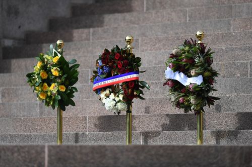 Pride of place: Floral tributes on the steps of the Anzac war memorial. Picture: AAP
