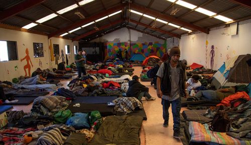 Members of the migrant caravan which grew as it crossed Central America, remain at the El Barretal shelter in Tijuana, Mexico.