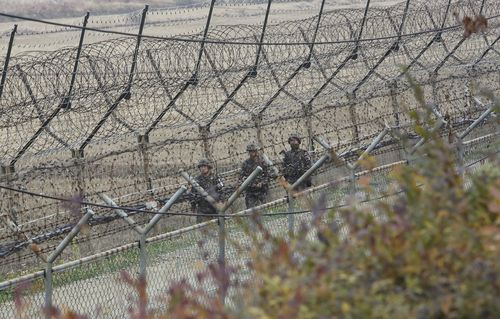 South Korean soldiers patrol near the border.