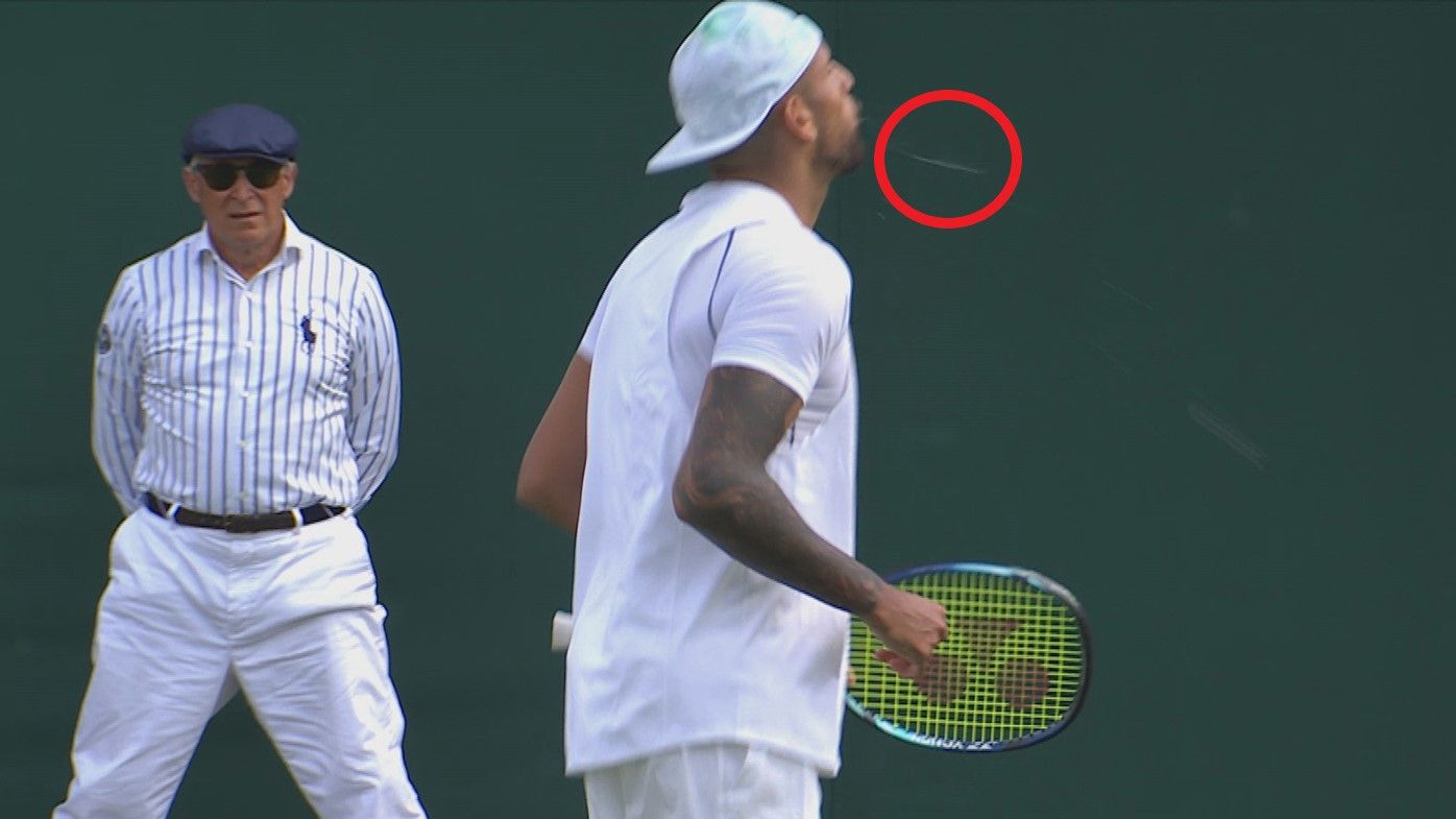 Nick Kyrgios spits in the direction of fans after his opening round win at Wimbledon.