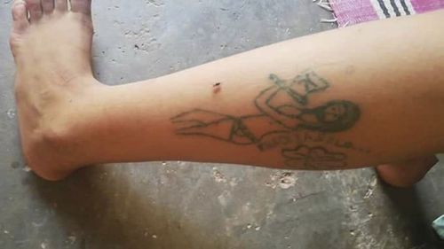 This undated photo provided by febrayer.com website shows tattoo marks on a 17-year-old Moroccan girl.