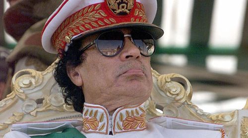 Colonel Gaddafi at a military parade in September 1999.