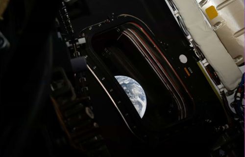 This image provided by NASA shows a downlink image of Earth taken by NASAs Artemis II astronaut commander Reid Wiseman inside the Orion capsule.