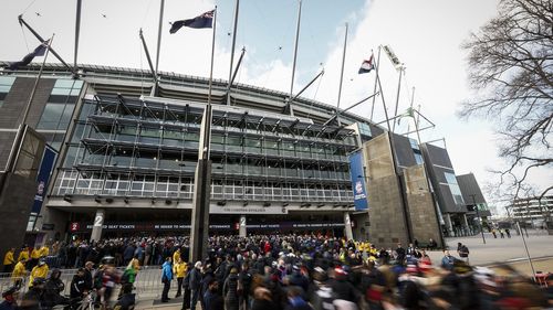 Fans line up at the MCC members entrance before the 2022 AFL Grand Final match between the Geelong Cats and the Sydney Swans at the Melbourne Cricket Ground on September 24, 2022 in Melbourne, Australia. (Photo by Darrian Traynor/AFL Photos/via Getty Images)