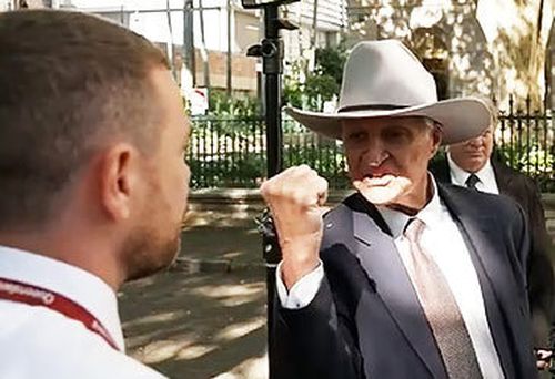 MP Bob Katter waves fist in journalist Josh Bavas' face (Nine)