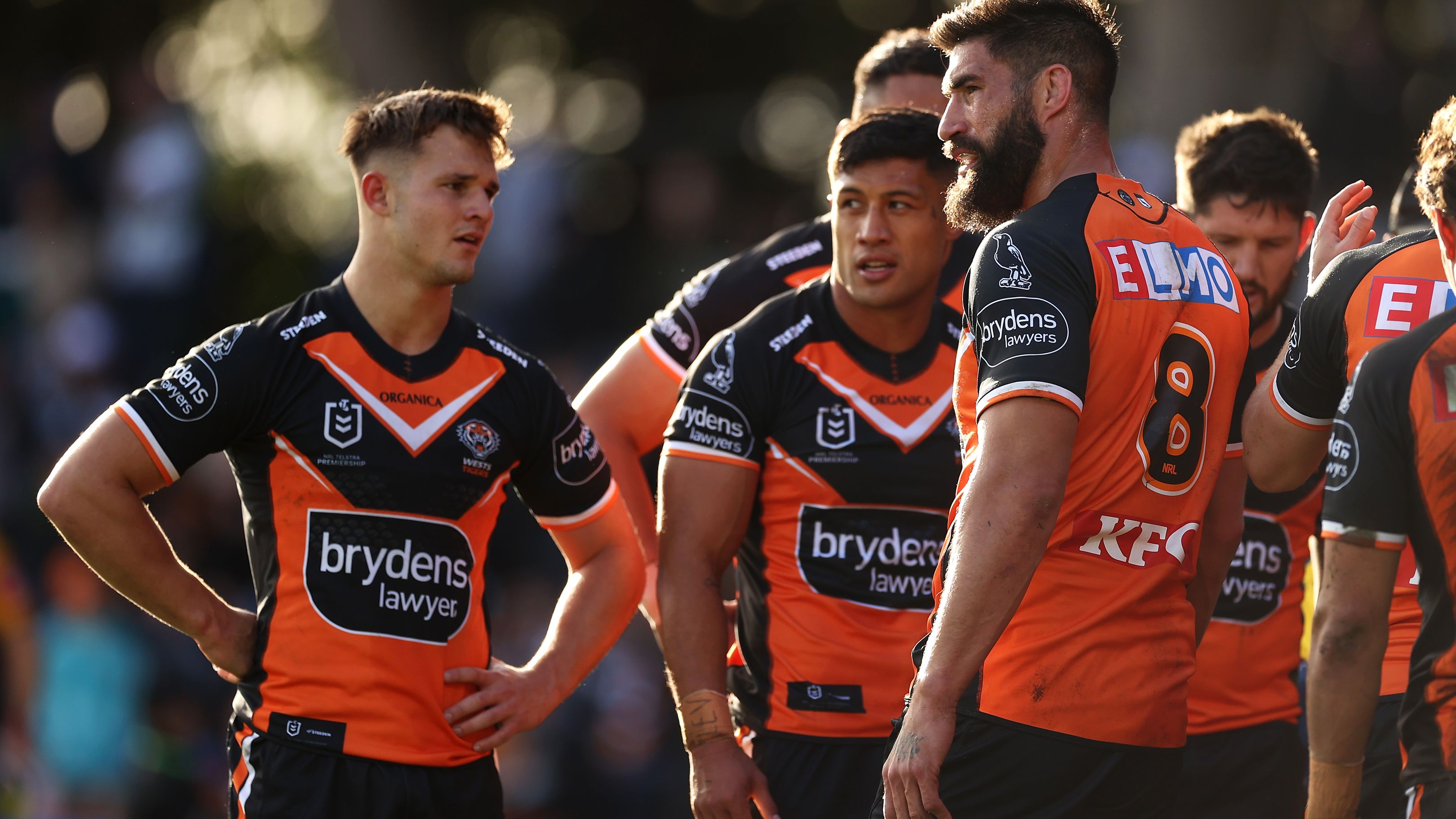 James Tamou of the Tigers and his team look dejected after a try to the Raiders.