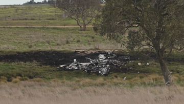 Police will work through the night to identify who was on board a light plane that crashed and burst into flames near Canberra.﻿