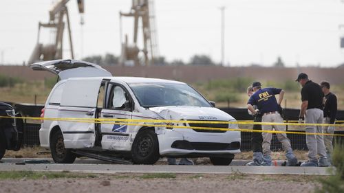 The mail van the gunman hijacked before killing Ms Granado and going on his shooting spree.