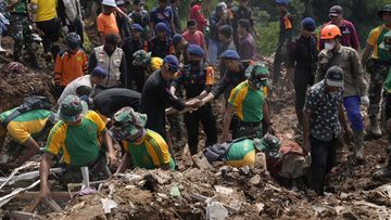 More rescuers and volunteers were deployed Wednesday in devastated areas on Indonesia&#x27;s main island of Java to search for the dead and missing from an earthquake that killed hundreds of people. (AP Photo/Tatan Syuflana)