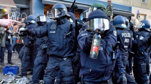 German police deploy pepper spray against protesters in the city of  Berlin. (AP).