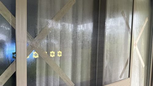 Hotel staff have taped the windows on guest rooms.