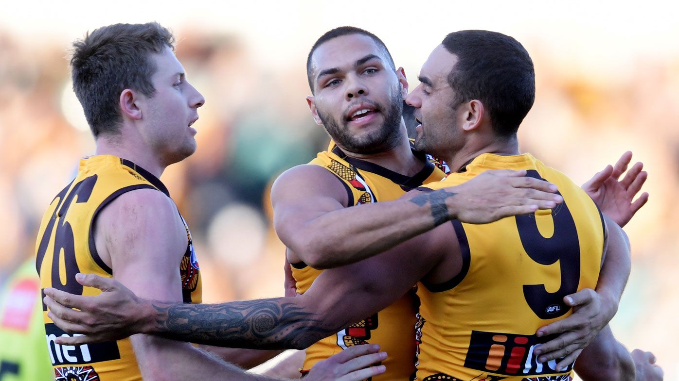 Hawks hold on, edge Port in AFL thriller