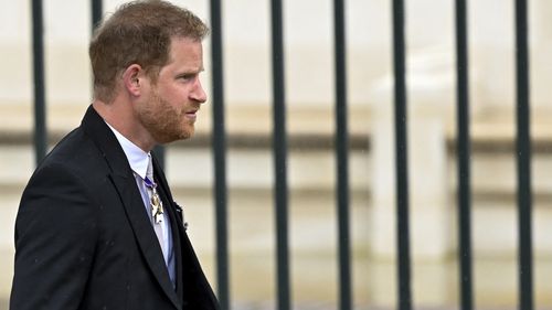 Britain's Prince Harry, Duke of Sussex arrives to attend Britain's King Charles III and Camilla, the Queen Consort, coronation ceremony at Westminster Abbey, London, Saturday, May 6, 2023. (Toby Melville, Pool via AP)