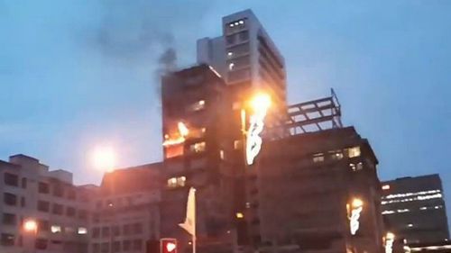 A fire at a 12-storey building in Manchester. (AAP)