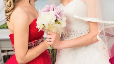 Bridesmaid with bride