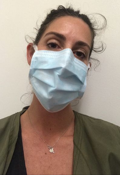 Michelle Stephenson wearing medical mask coronavirus scare