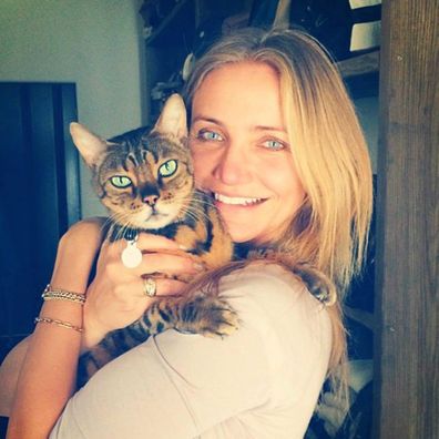 A photo of Cameron Diaz and a cat shared by Benji Madden