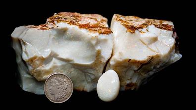 ** HOLD FOR STORY ** In this photo provided by Alaska Premier Auctions & Appraisals is an opal specimen they say is one of the largest gem-quality opals in existence in Anchorage, Alaska on Dec. 20, 2021. The item is set for auction on Sunday, Feb. 20, 2022. (Dana Fuentes/Alaska Premier Auctions & Appraisals via AP)