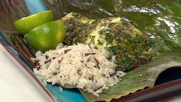 Fish in banana leaves with chimichurra sauce