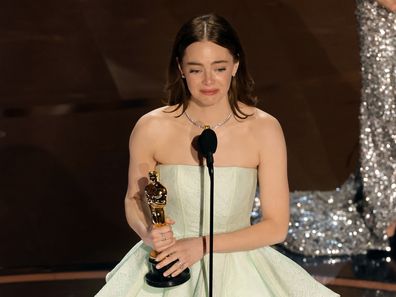 HOLLYWOOD, CALIFORNIA - MARCH 10: Emma Stone accepts the Lead Actress award for "Poor Things" onstage during the 96th Annual Academy Awards at Dolby Theatre on March 10, 2024 in Hollywood, California. (Photo by Kevin Winter/Getty Images)