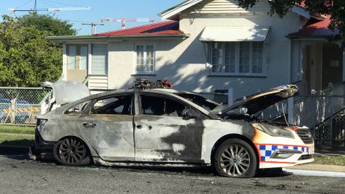 The vehicle was parked outside Coorparoo station 
on Knowsley Street when it was found alight. (9NEWS)