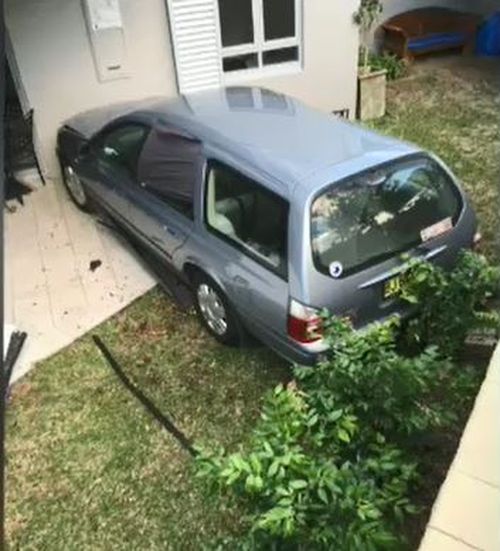 Witnesses said they were amazed he came out of the car unscathed, considering the busy traffic on the street. Picture: 9NEWS.