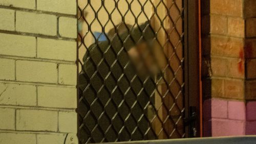 A man being arrested by NSW Police as part of Strike Force Sweetenham.