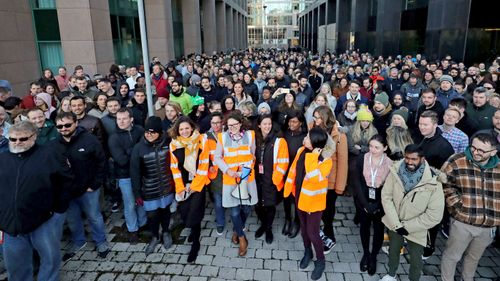 Hundreds of Google staff members around the world have walked off the job in protest of the internet company's treatment of executives accused of sexual misconduct.