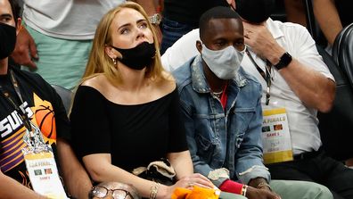 Singer Adele and Rich Paul attend game five of the NBA Finals at Footprint Center on July 17, 2021 in Phoenix, Arizona.  The Bucks defeated the Suns 123-119. 
