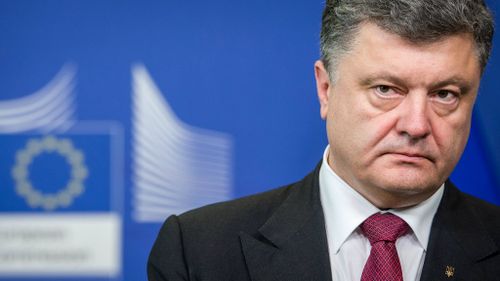 Ukrainian President Petro Poroshenko addresses the media at the European Commission summit in Brussels. (AP Photo/Geert Vanden Wijngaert)