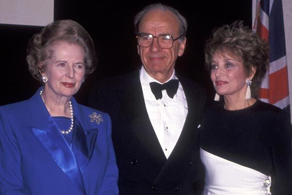 Murdoch with Margaret Thatcher and Barbara Walters in 1991. (Getty)