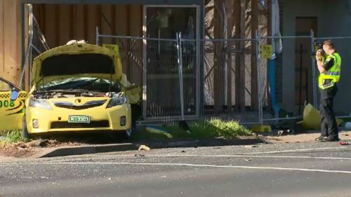 The driver of the taxi died at the scene. (9NEWS)
