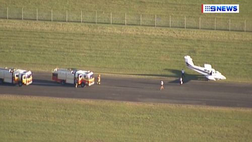 Emergency crews met the plane on the tarmac. (9NEWS)