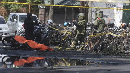 The family drove a car and motorbikes into churches, which then exploded - killing at least 13 people and injuring more than 40 others. Picture: AAP.