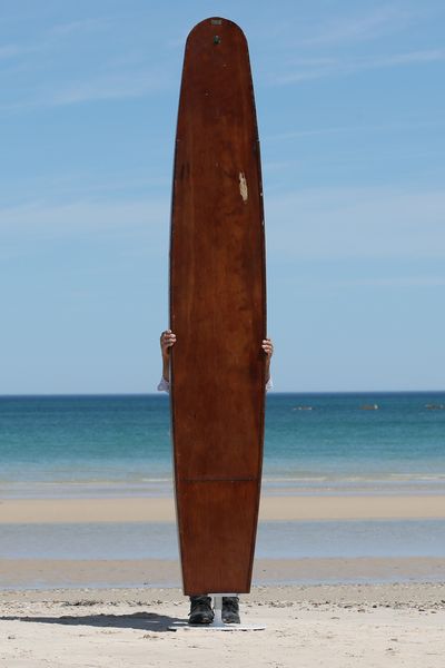 Surfboards initially made from wood