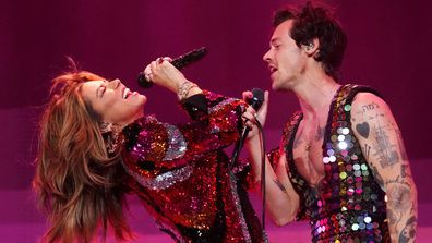Shania Twain and Harry Styles perform onstage during Coachella