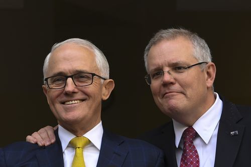 Loyal to the end, Scott Morrison stood shoulder to shoulder with outgoing PM Malcolm Turnbull on Wednesday.